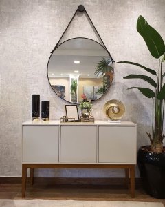 Stylish mirror with flaux leather strap