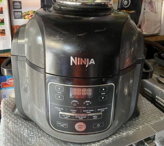 Neat used Deluxe XL pressure cooker