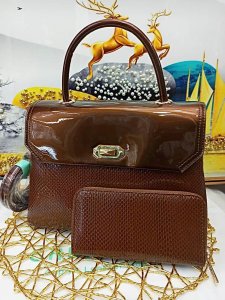 Patent handbag with extra long strap and purse