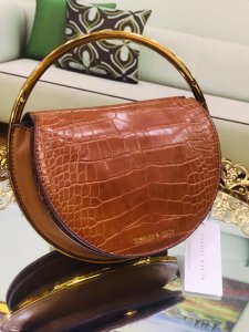 Croc-Effect Circle Clutch purse