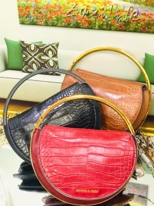 Croc-Effect Circle Clutch purse